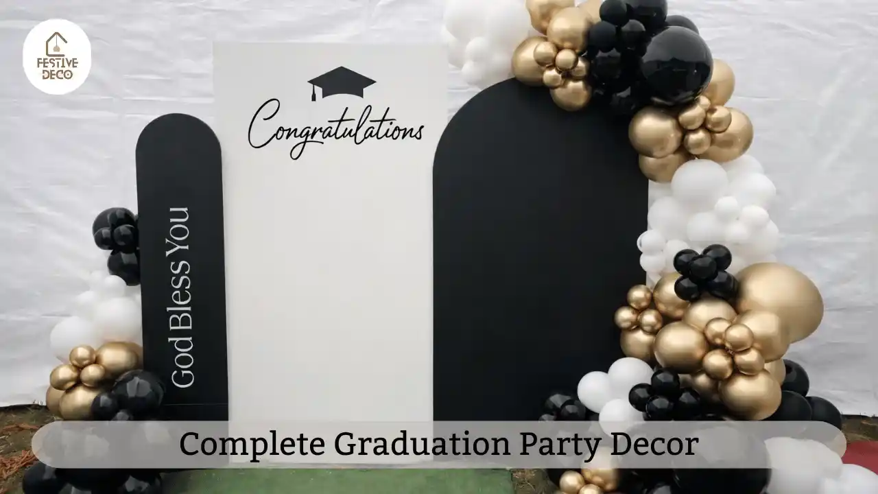 A cohesive graduation party decoration setup showing backdrop, table decor and balloons for a stylish celebration at home.